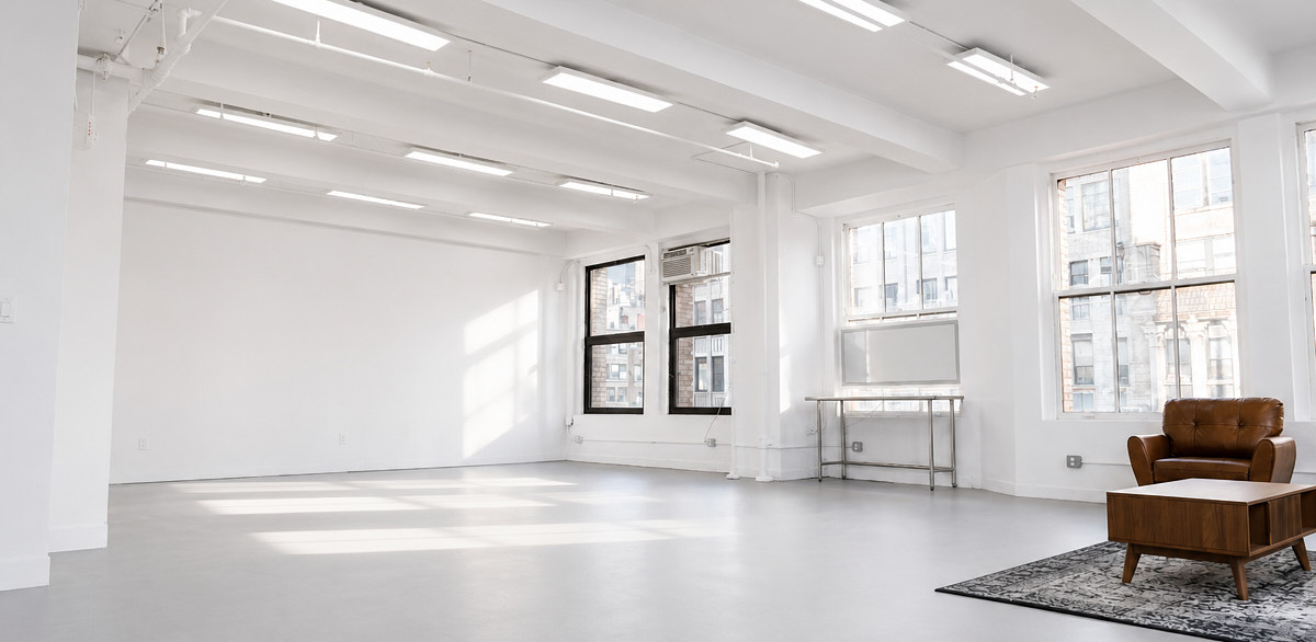 Bright open blank studio floor in the Garment District ready for a pop-up shop or brand activation setup