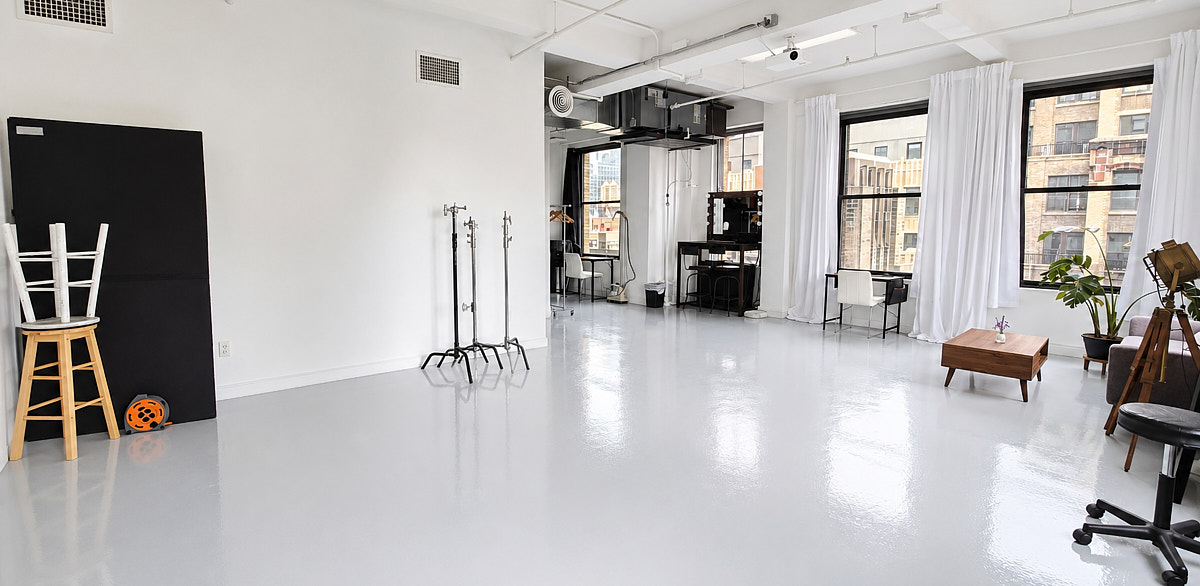 Studio 2110 interior with natural light used as a controlled video podcast recording space