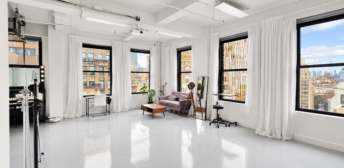 Self-tape friendly studio corner with window light and a clean backdrop area in a Midtown Manhattan taping room